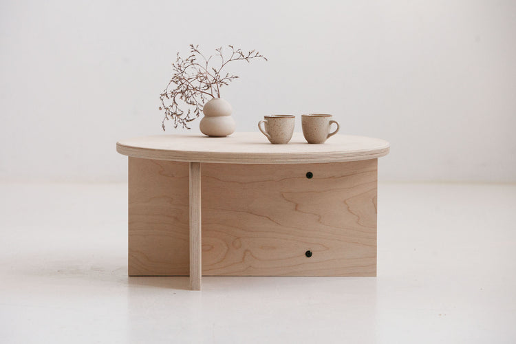 Minimalist Japandi style coffee table USA with round top and storage shelf