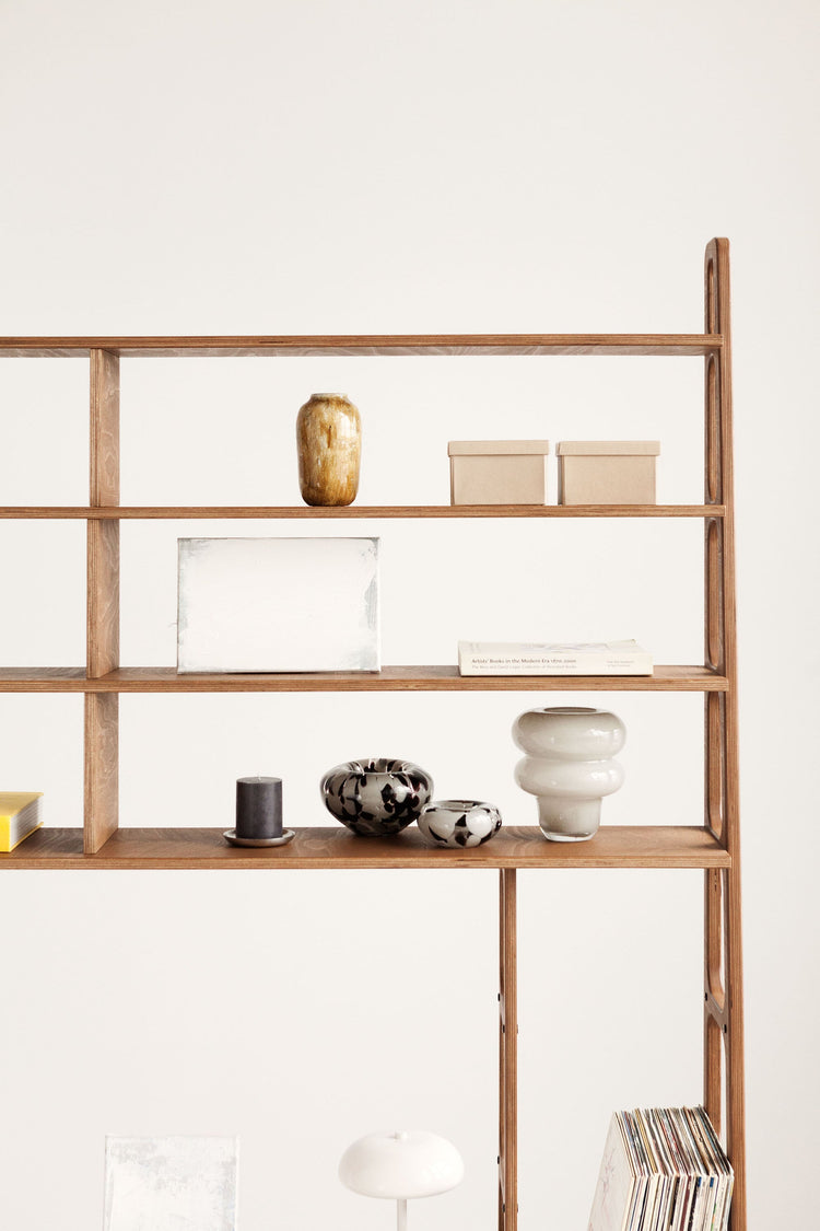 detail-of-mid-century-bookcase-with-cabinet-and-drawers-walnut-stain-in-living-room