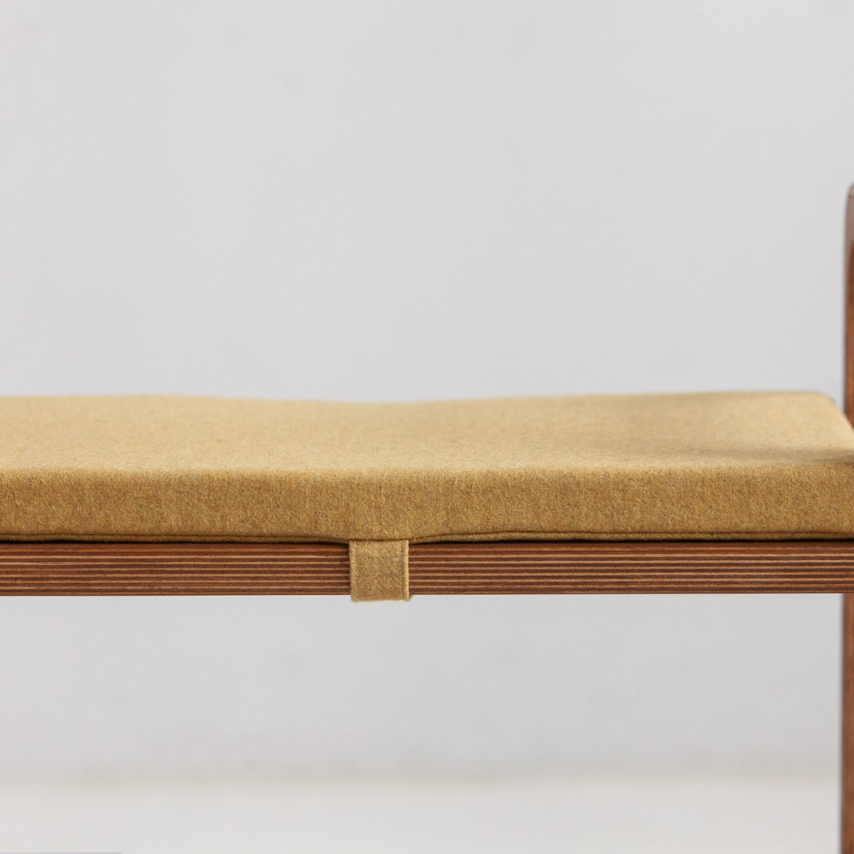 Bench with straight legs and cushion