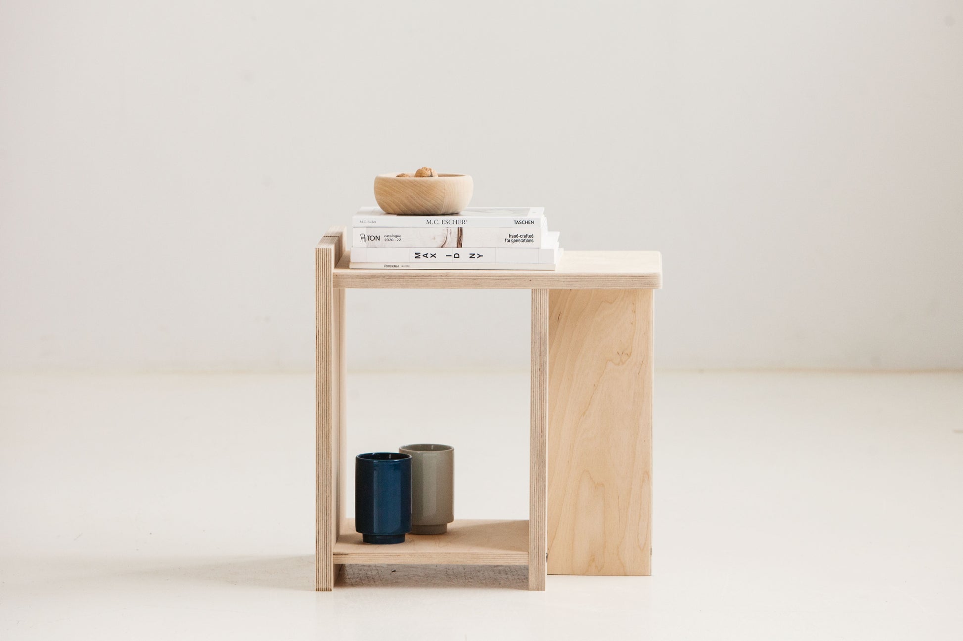 Scandinavian Japandi stool with warm birch wood finish