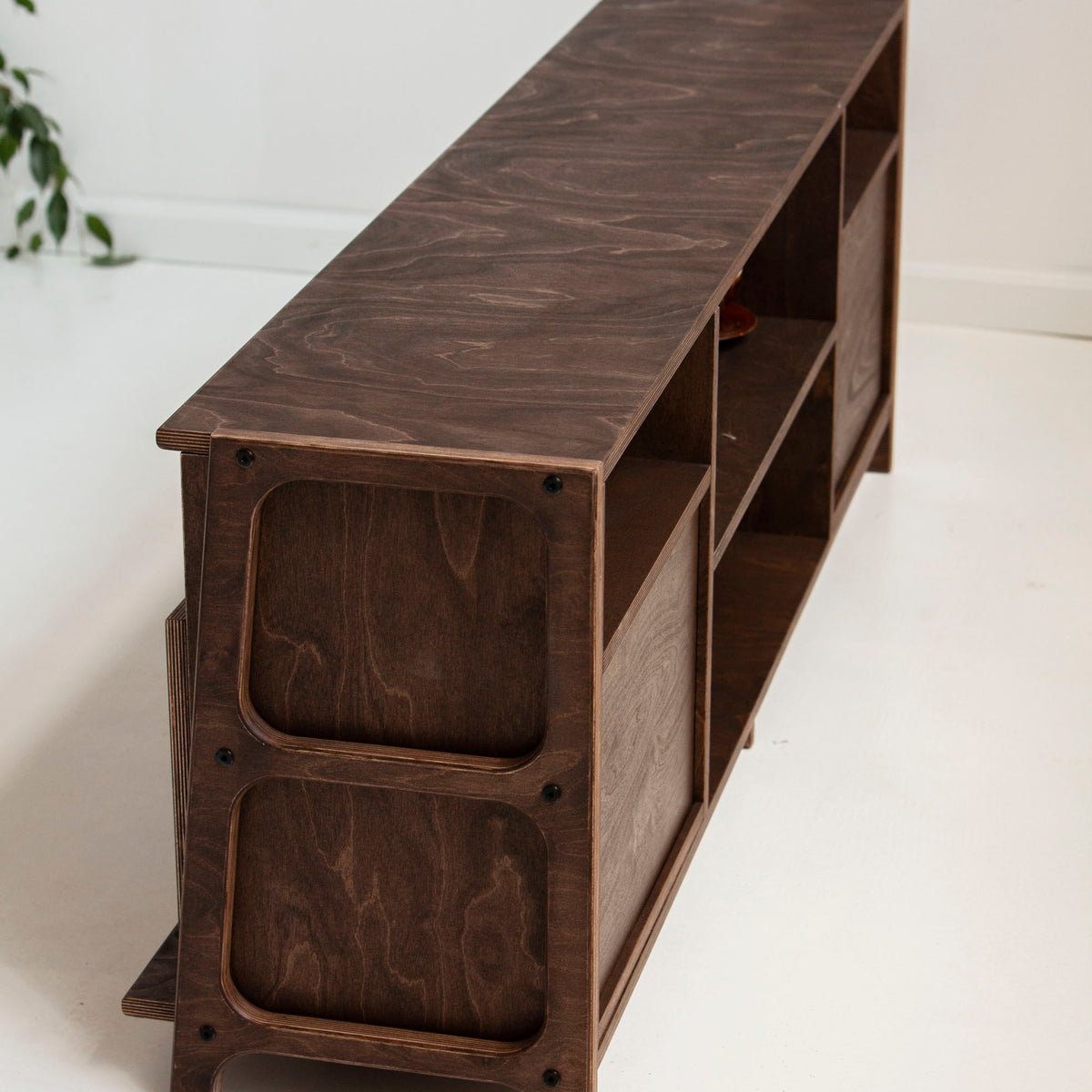 Wooden bookshelf with a white background
