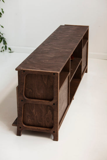 Wooden bookshelf with a white background