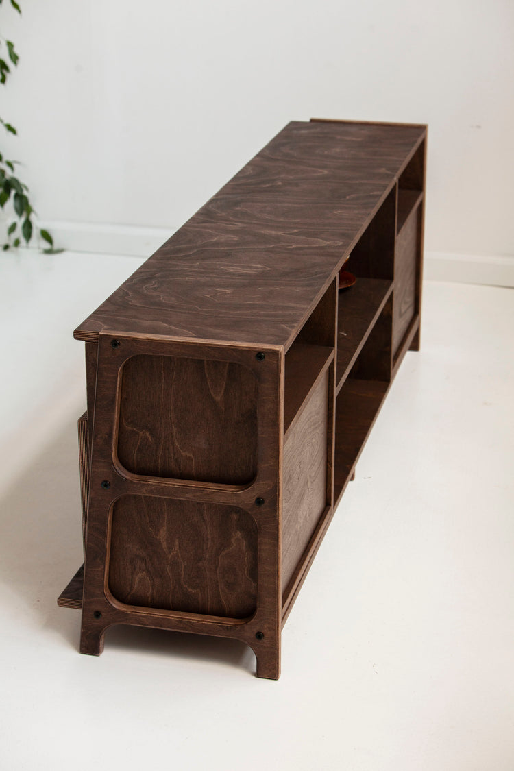 Wooden bookshelf with a white background