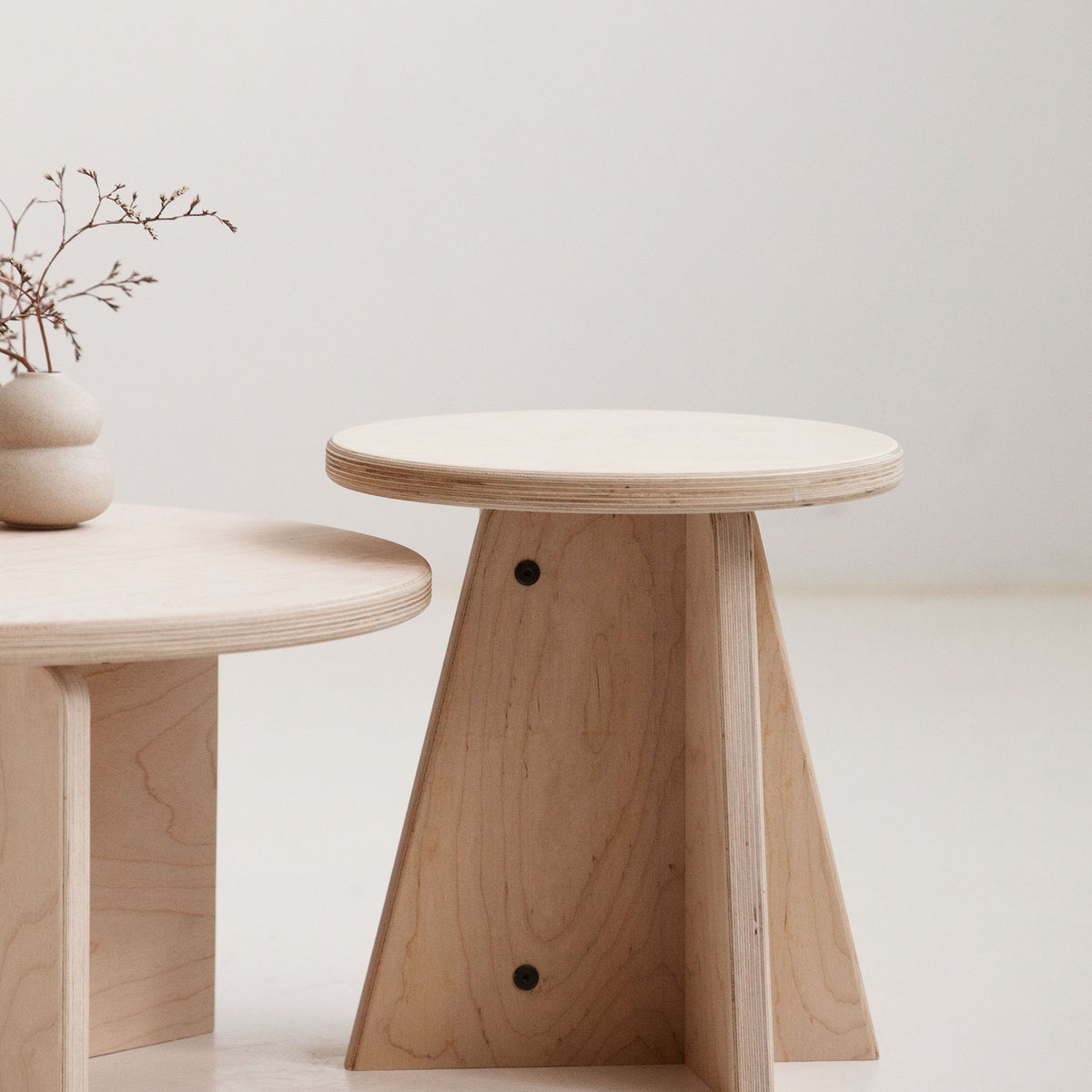 detail of Modern nesting coffee tables set with custom finishes USA