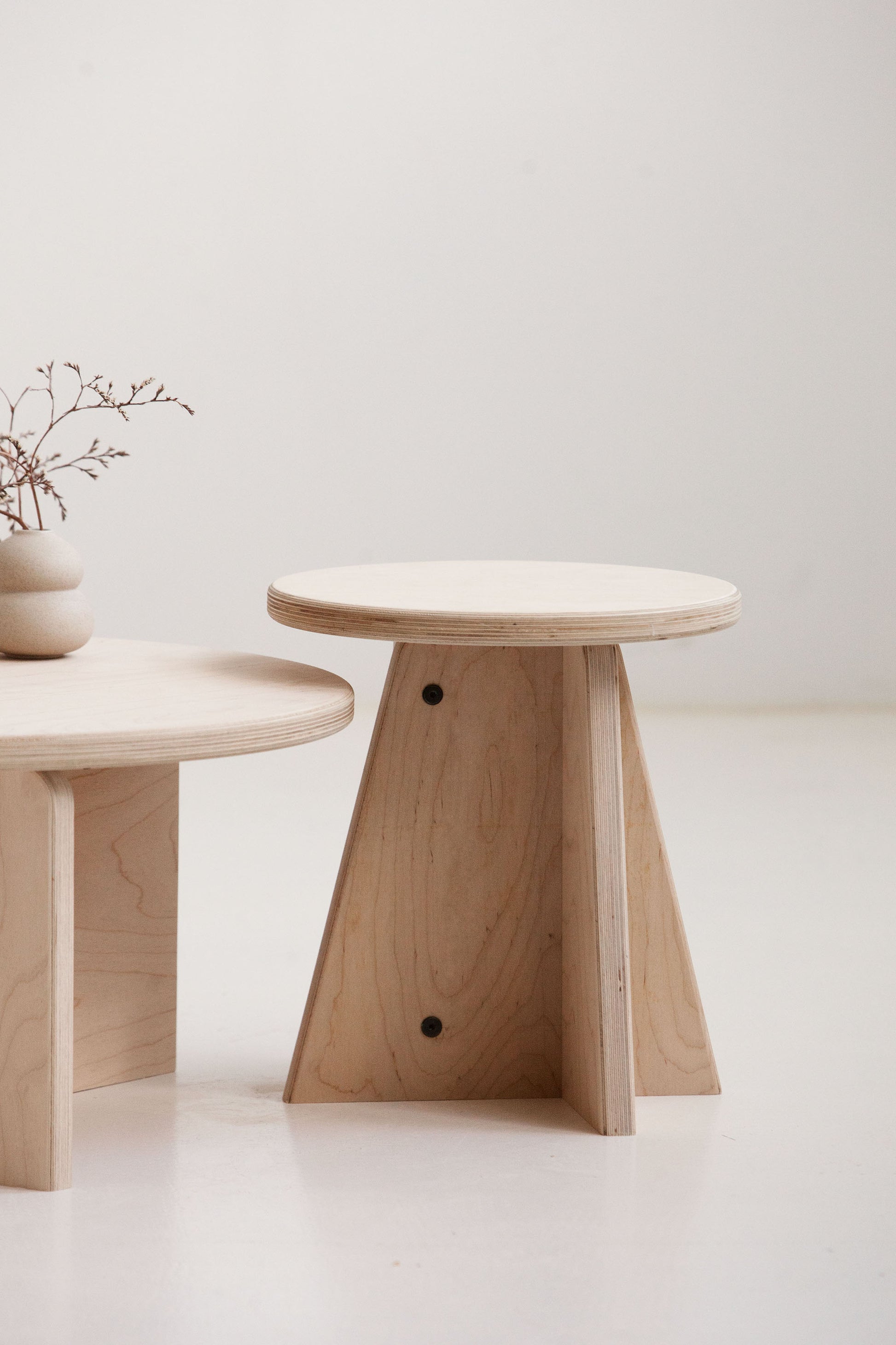 detail of Modern nesting coffee tables set with custom finishes USA