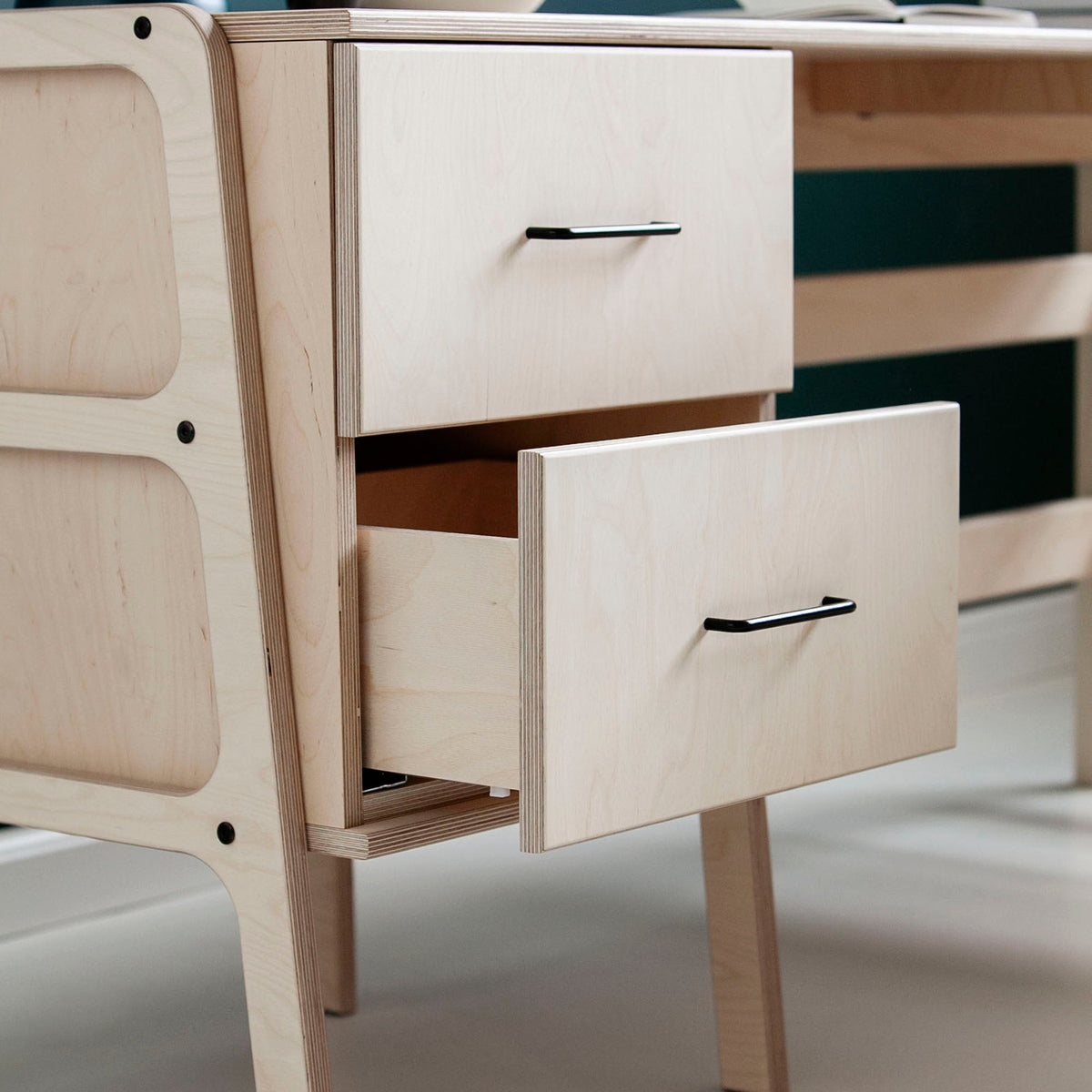 Mid-century-modern-corner-desk-with-drawers-and-shelves-in-natural-wood-stain